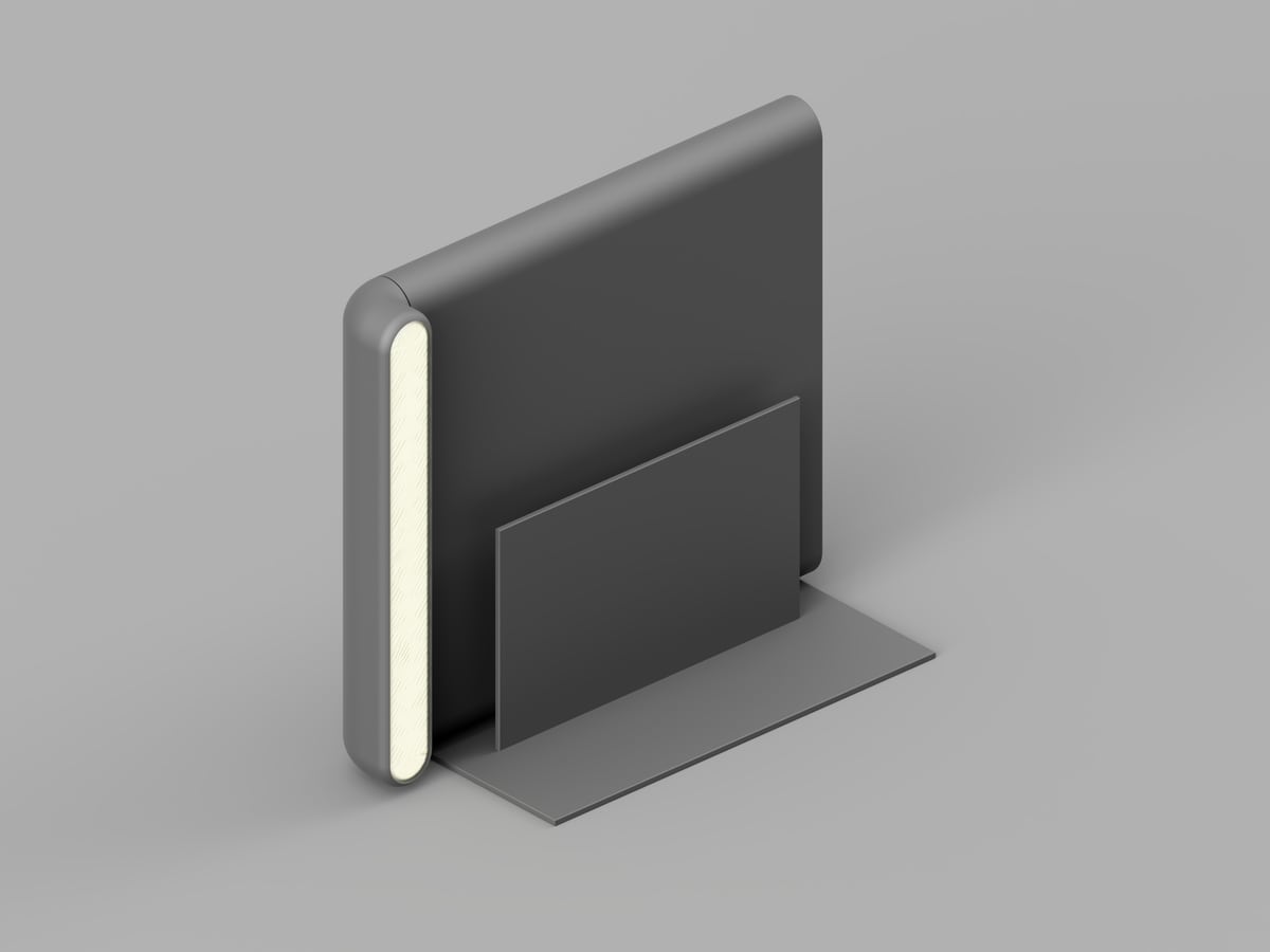 Gray studio render of a dark gray slim bookend with a vertical warm light strip and a front pocket plate