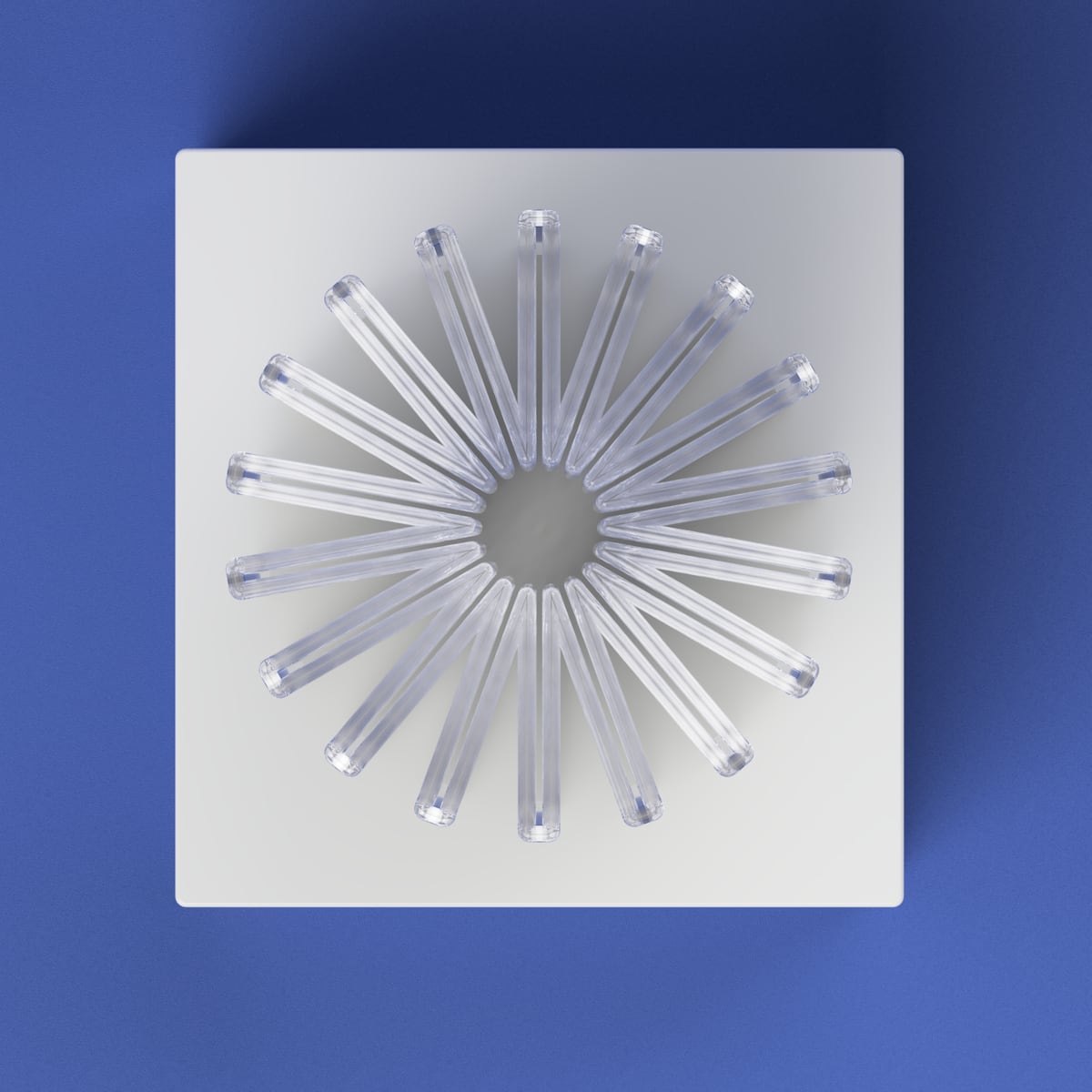 Top-view render of clear radial tubes arranged in a ring on a white base, on a blue background